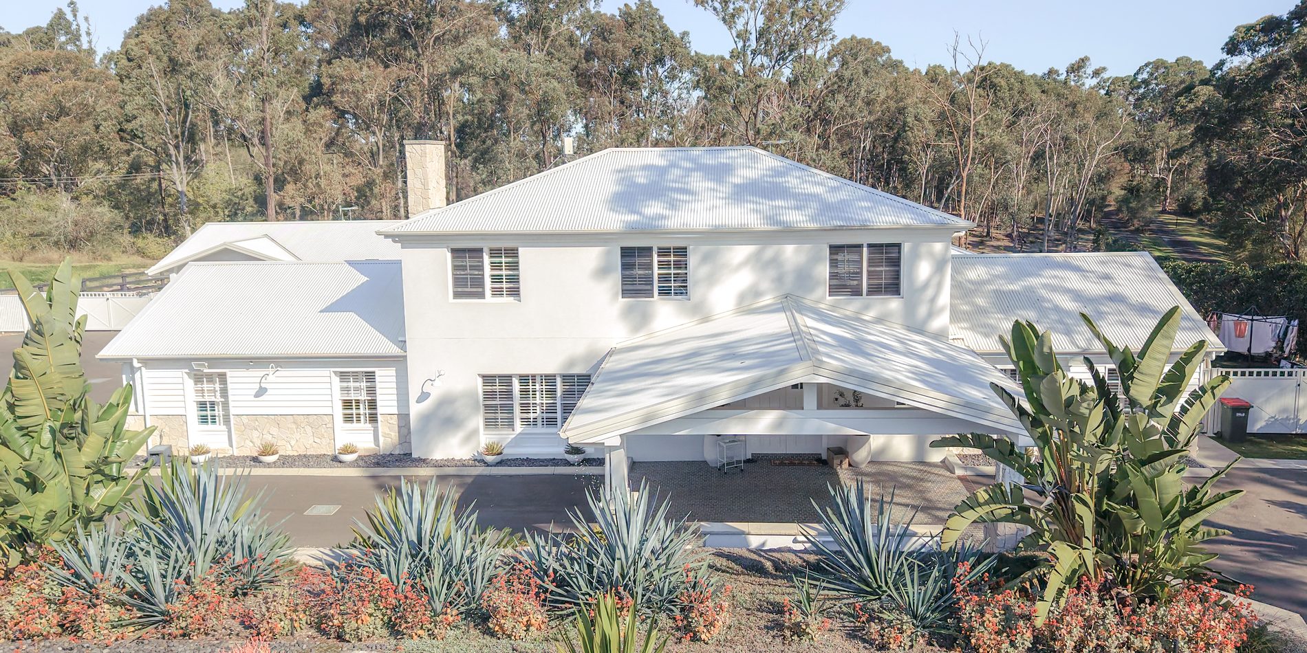The house from the front, above the succulent terrace