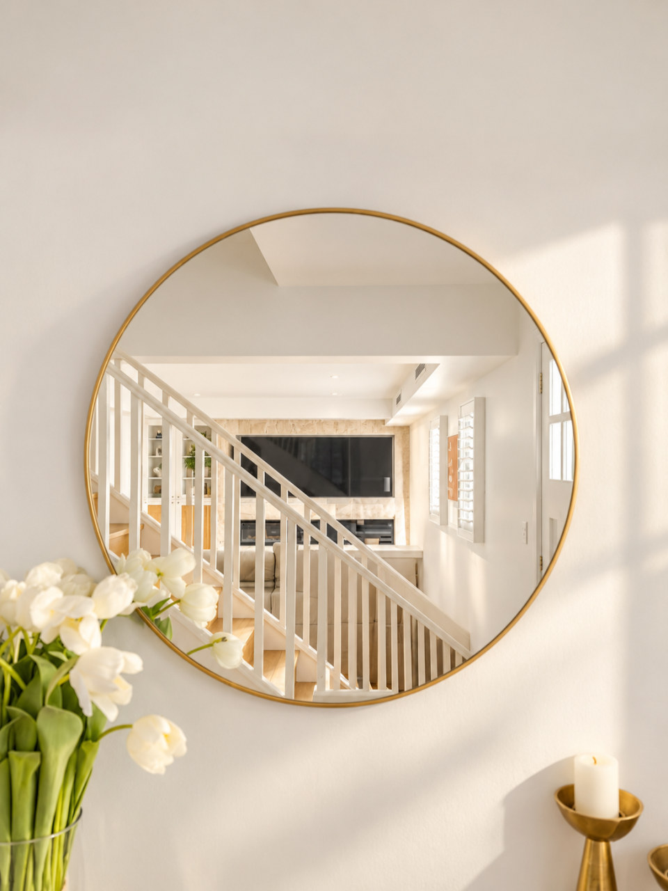 The stair, seen in the hall mirror