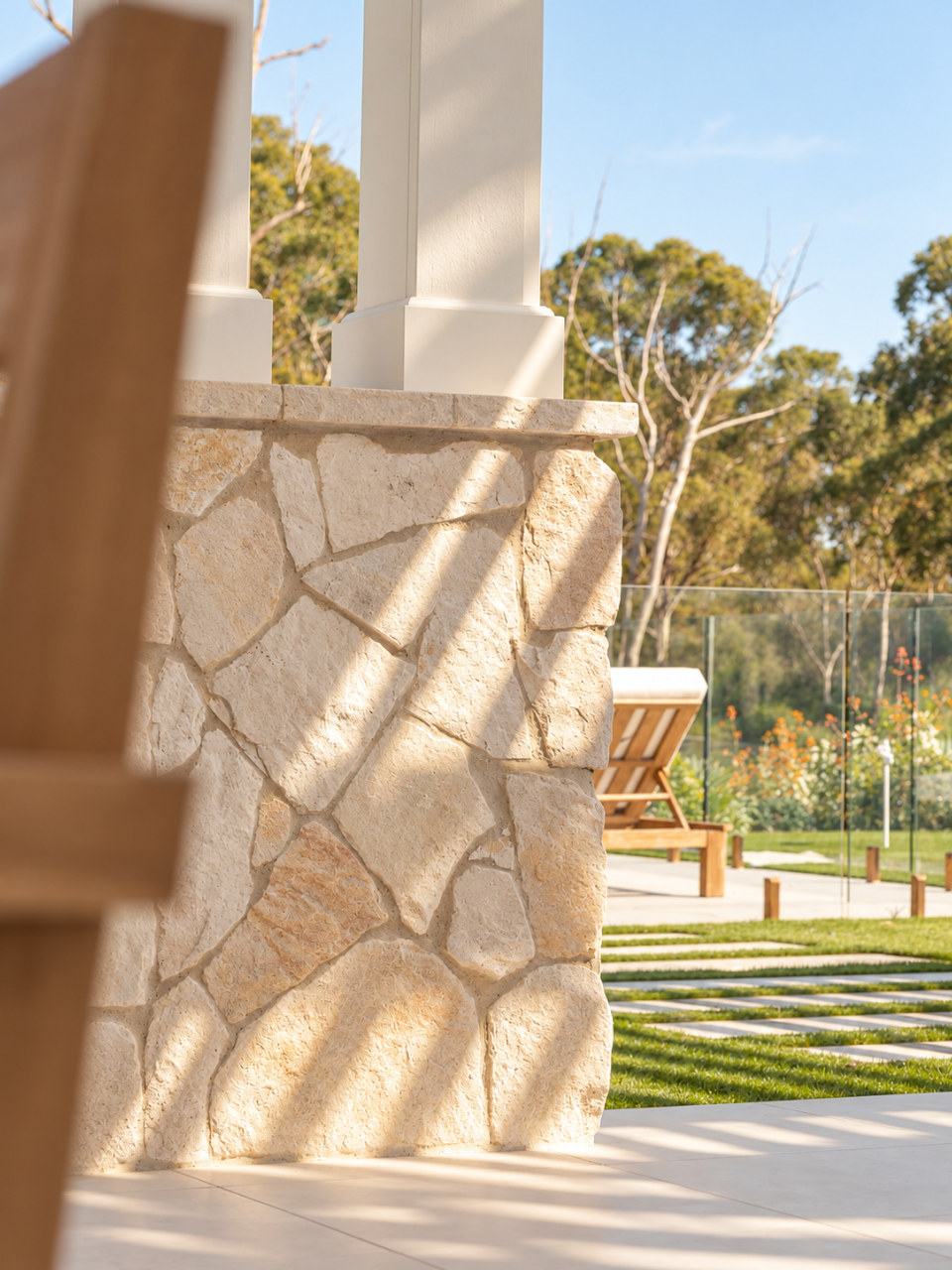 Afternoon light across the crazy paving
