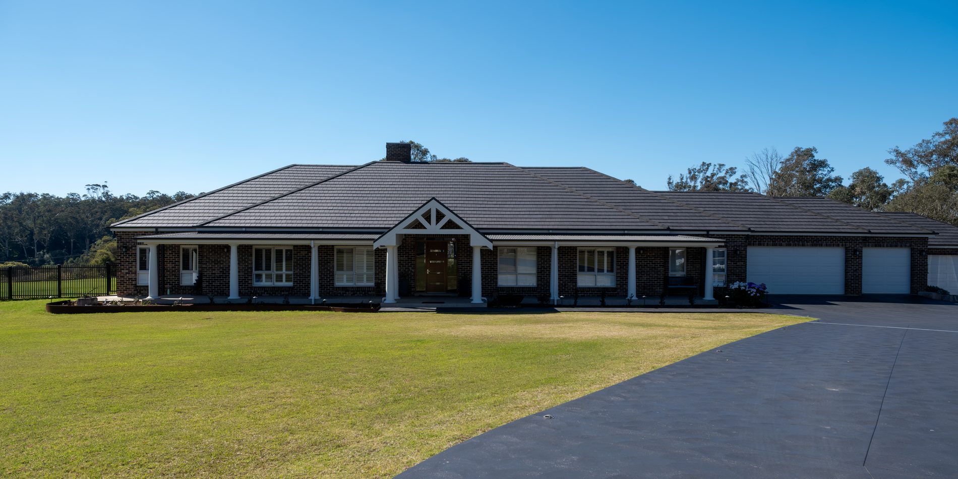 The front elevation across the paddock