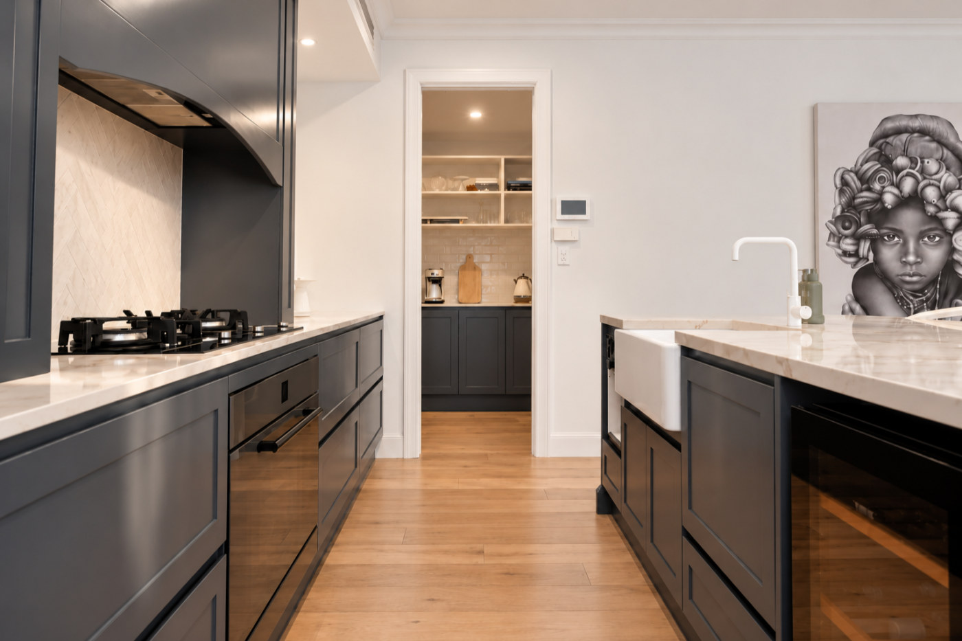 Galley kitchen running through to the butler’s pantry